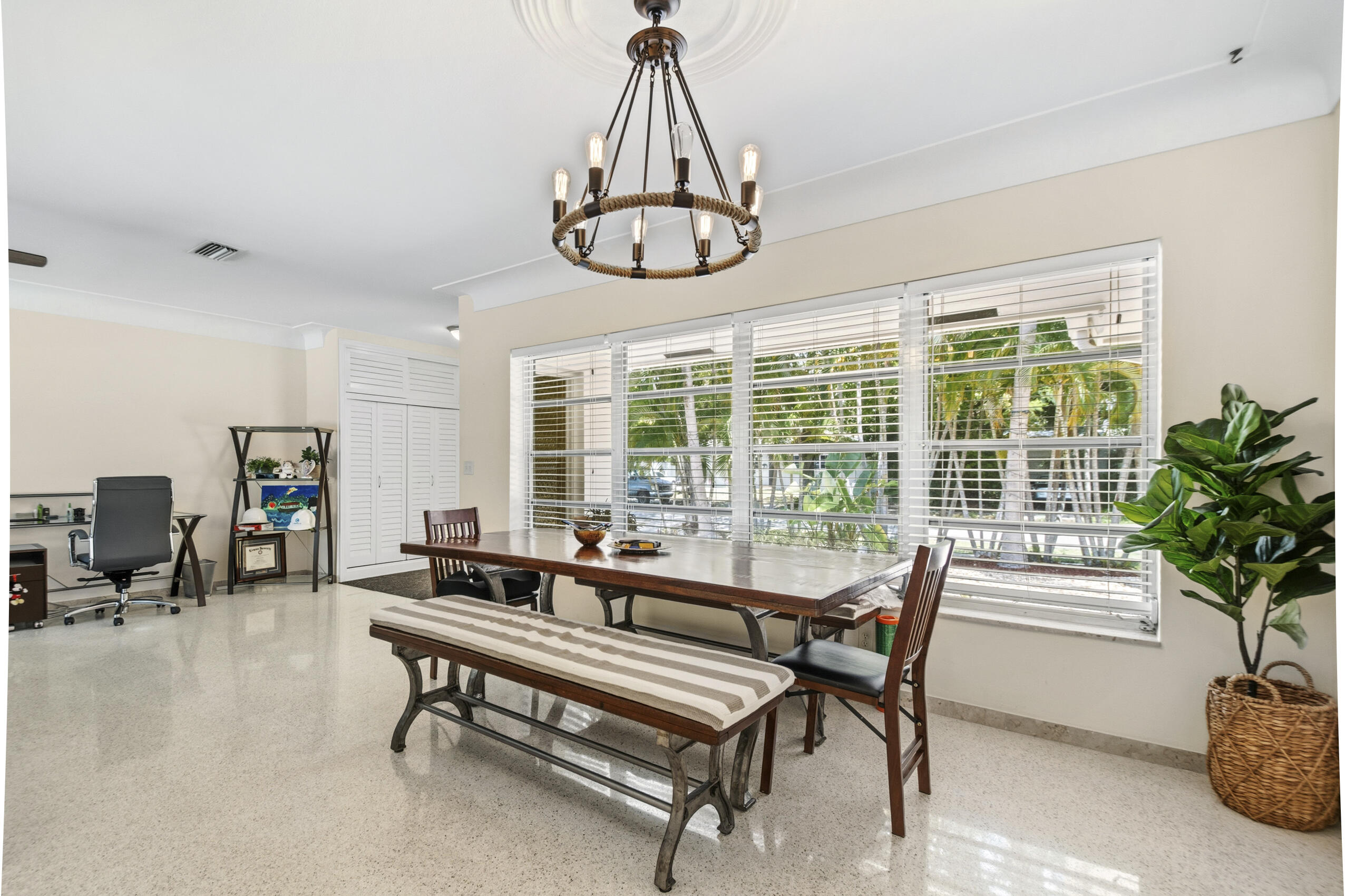 1348 Southwest 4th Street Boca Raton, FL 33486 - Photo 9 of 44 a living room with furniture a potted plant and a large window