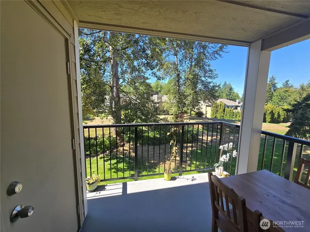 a view of a porch with a furniture