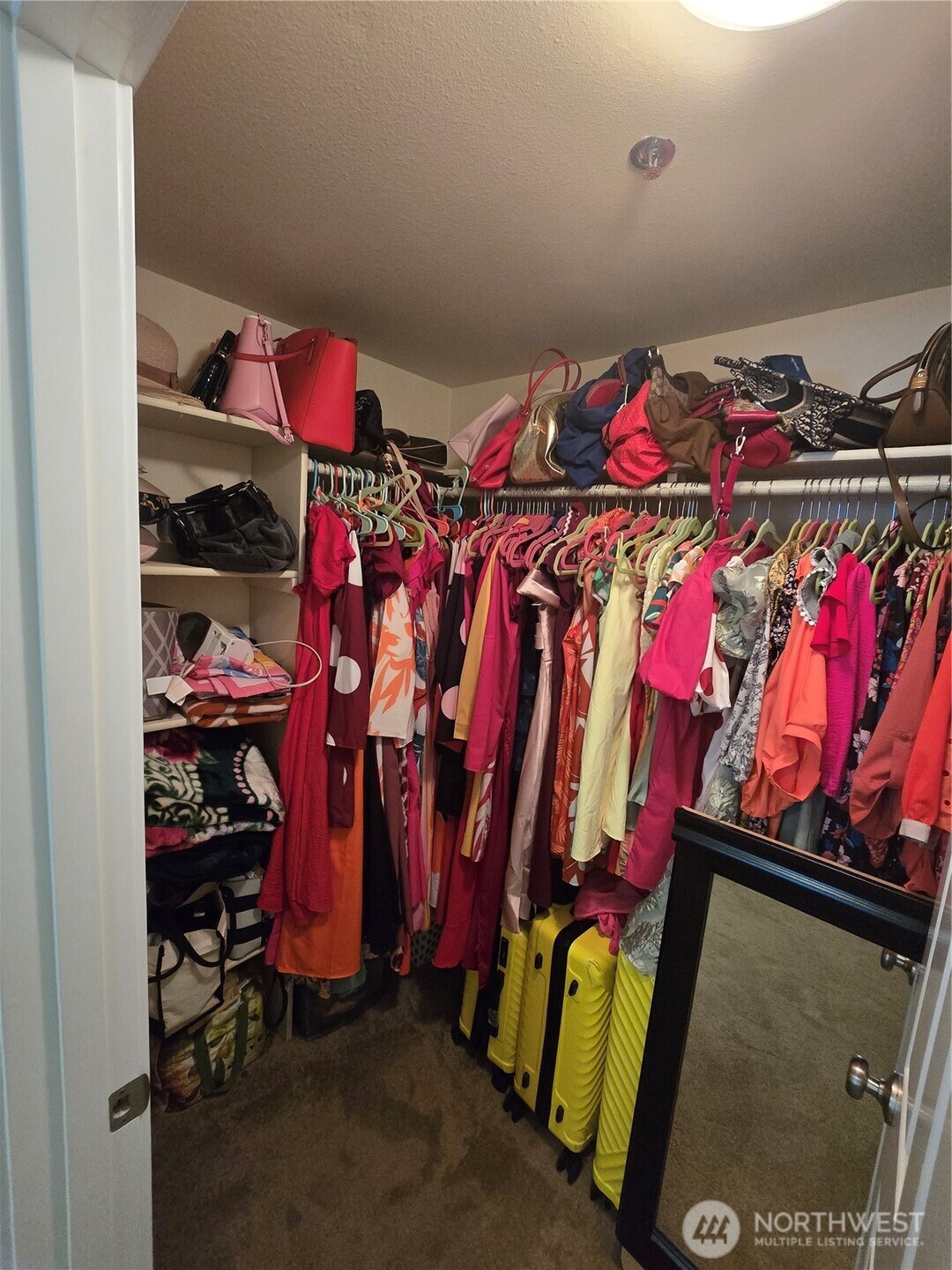 1840 South 284th Lane, Unit H204 Federal Way, WA 98003 - Photo 6 of 14 a view of walk in closet with clothes