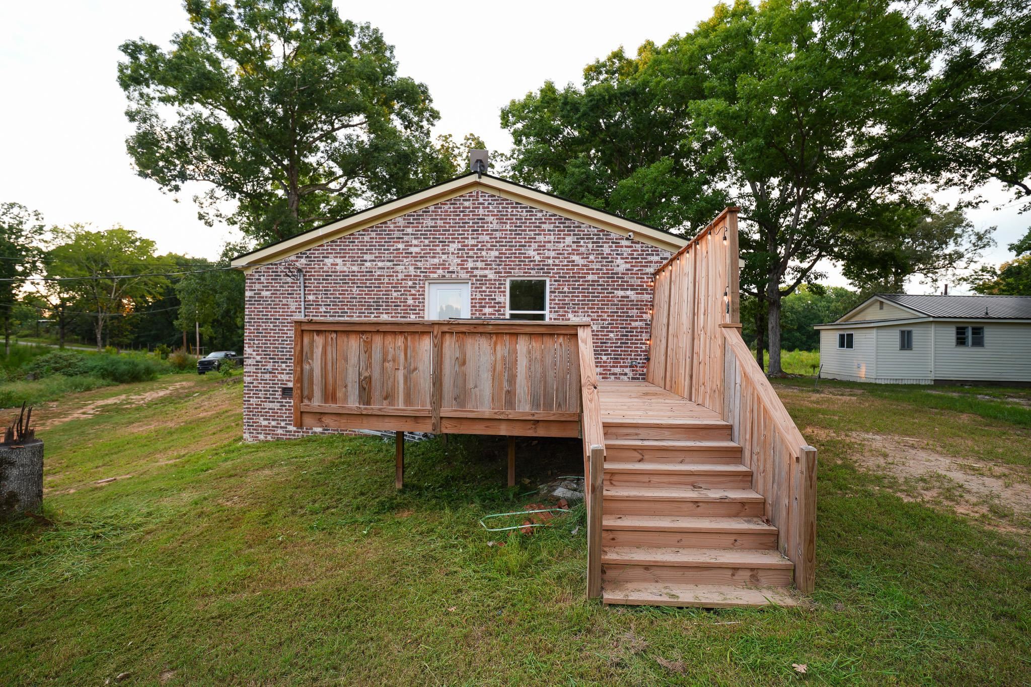 2525 Pittman Road Somerville, TN 38068 - Photo 19 of 38 Brick exterior with multiple windows