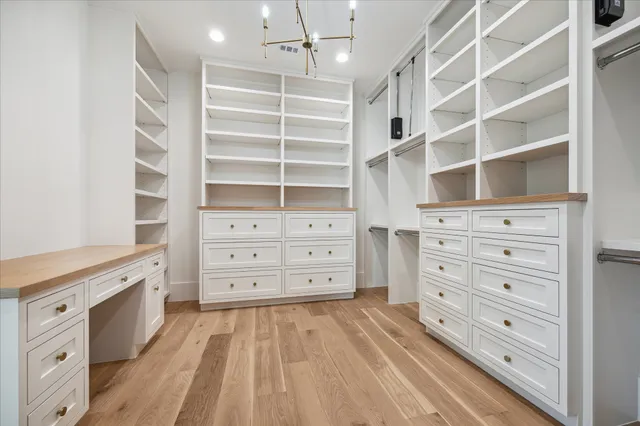 a view of an empty walk in closet