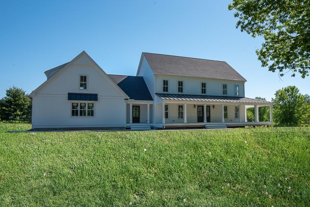 109 Merriam Road Grafton, MA 01519 - Photo 1 of 6 a view of a house with a yard