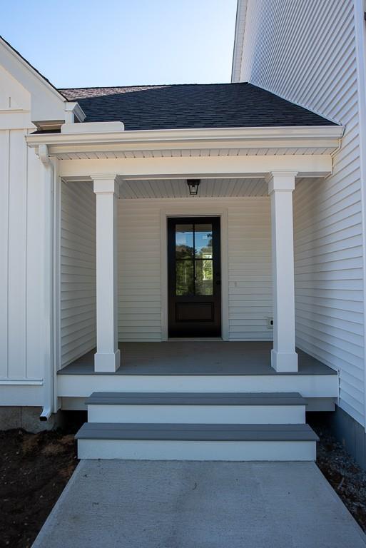 109 Merriam Road Grafton, MA 01519 - Photo 2 of 6 a view of entryway with a bathtub