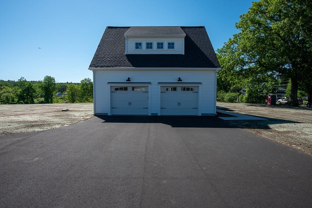 109 Merriam Road Grafton, MA 01519 - Photo 4 of 6 a view of a house with a street