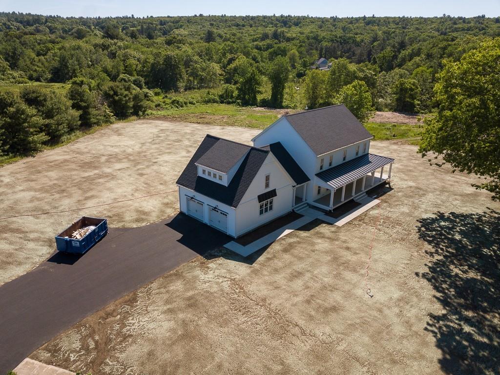 109 Merriam Road Grafton, MA 01519 - Photo 5 of 6 a view of a two chairs in the roof yard