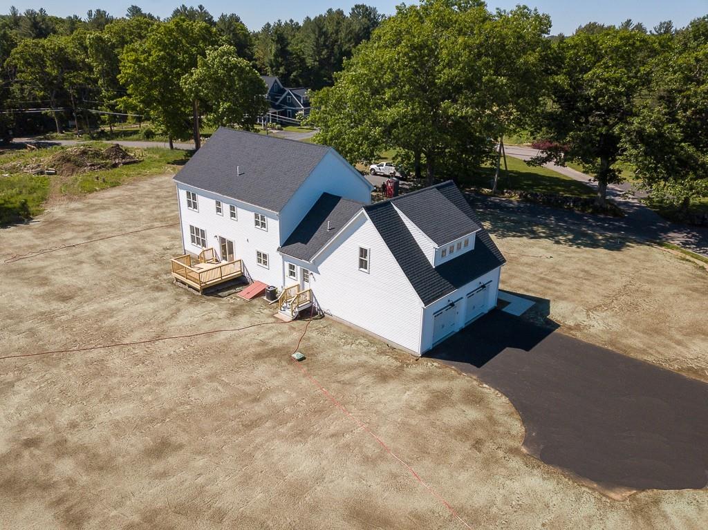 109 Merriam Road Grafton, MA 01519 - Photo 6 of 6 a view of a house with a yard