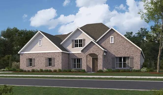 a view of a big house with a big yard and large trees