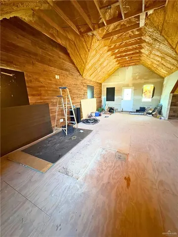 a view of a swimming pool with a sitting area