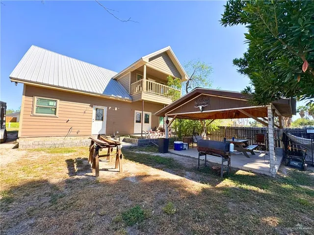a view of a backyard with a garden