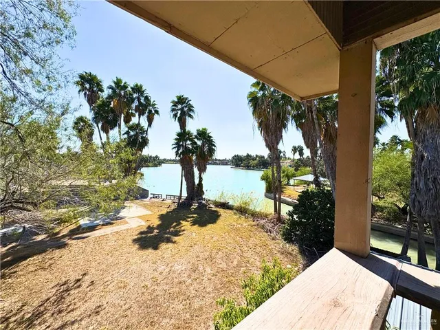 a view of a swimming pool with a sitting space
