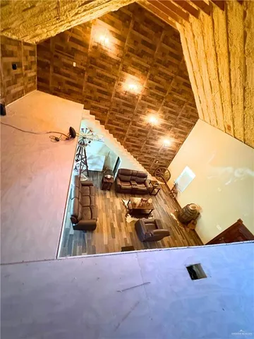 a view of backyard with table and chairs