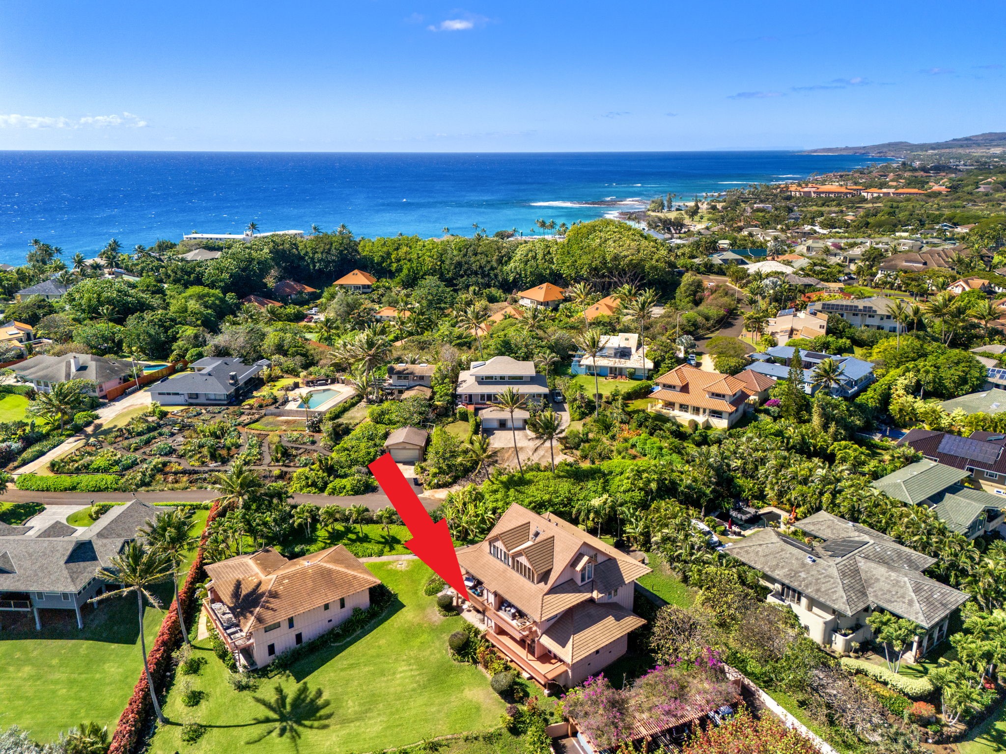 1568 Pe'e Road, Unit 211 Koloa, HI 96756 - Photo 3 of 30 an aerial view of residential houses with outdoor space and ocean view