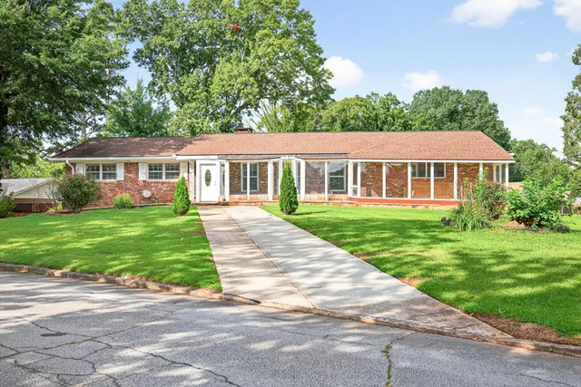 front view of a house and a yard