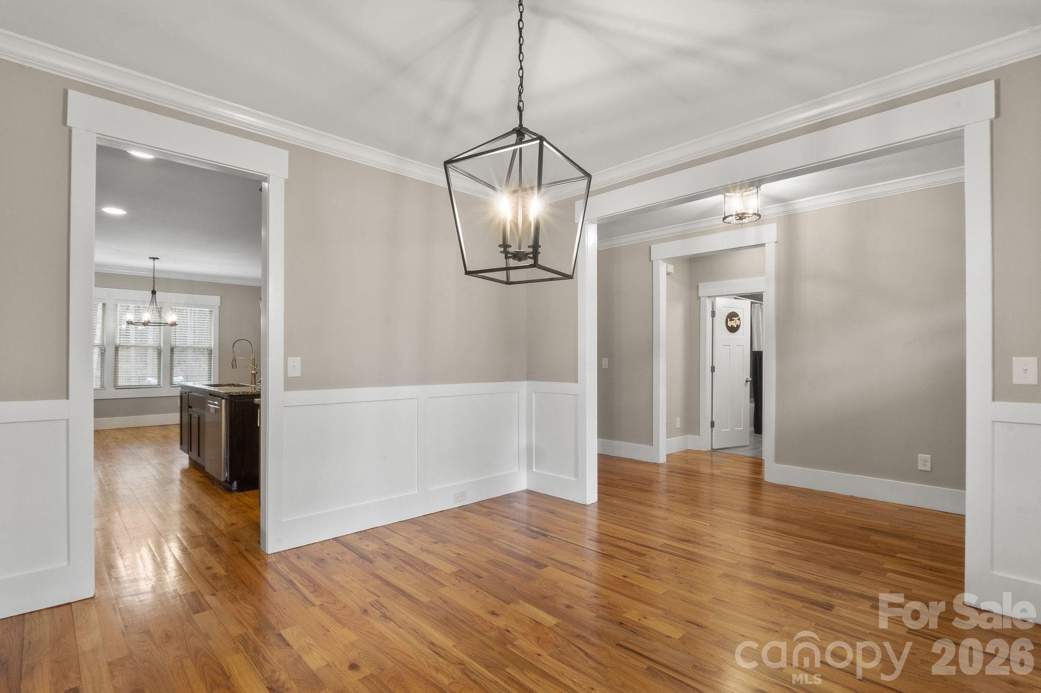 7261 Bay Ridge Drive Denver, NC 28037 - Photo 15 of 48 a view of a room with wooden floor and a bathroom