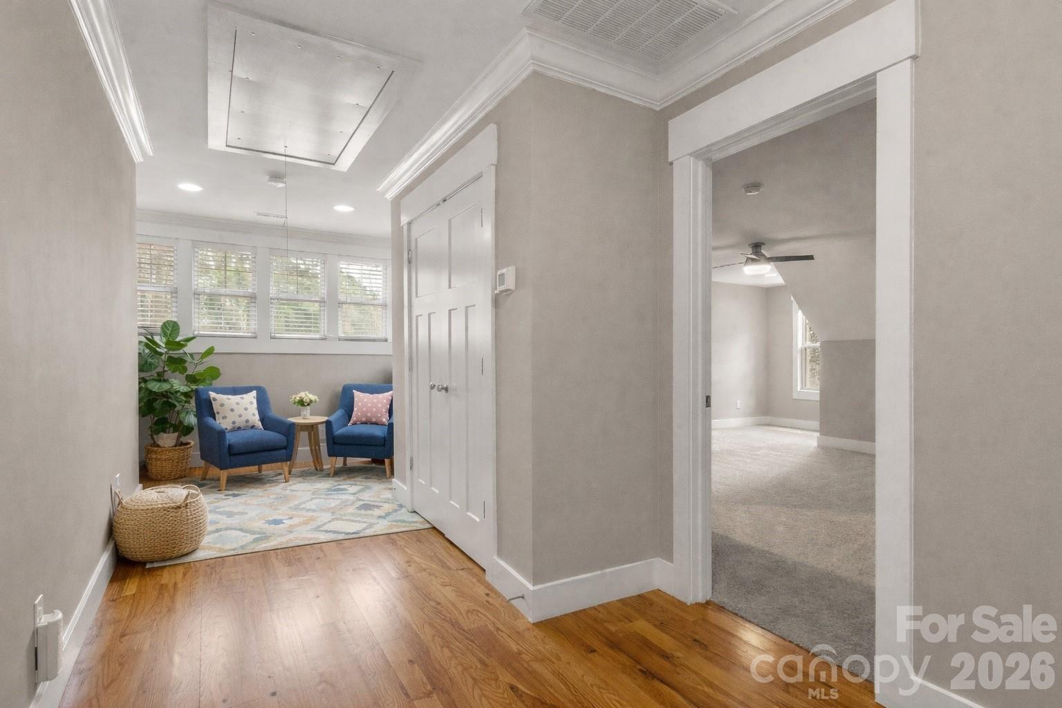 7261 Bay Ridge Drive Denver, NC 28037 - Photo 34 of 48 a view of a hallway with wooden floor and a livingroom