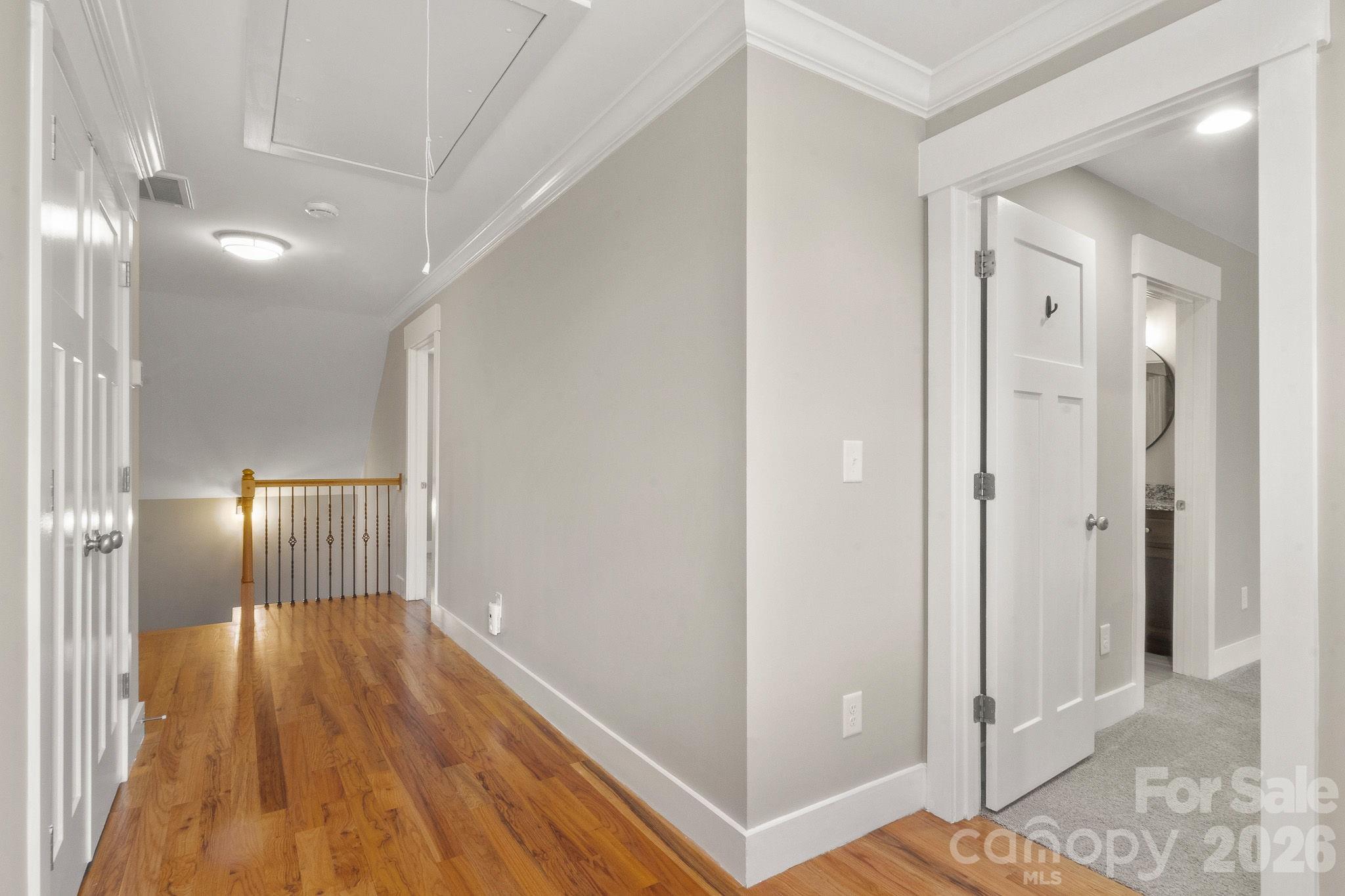 7261 Bay Ridge Drive Denver, NC 28037 - Photo 36 of 48 a view of a hallway with wooden floor