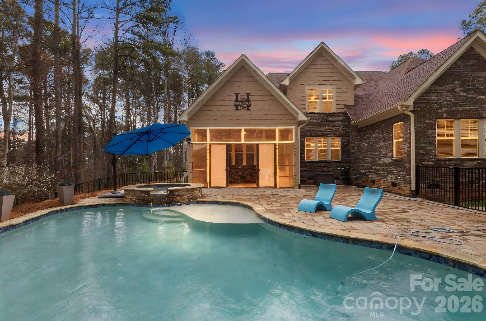7261 Bay Ridge Drive Denver, NC 28037 - Photo 7 of 48 a view of a house with pool and sitting area