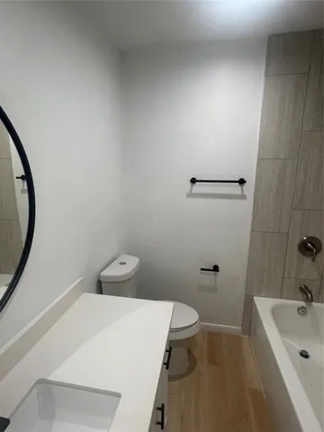 a bathroom with a sink and a bathtub