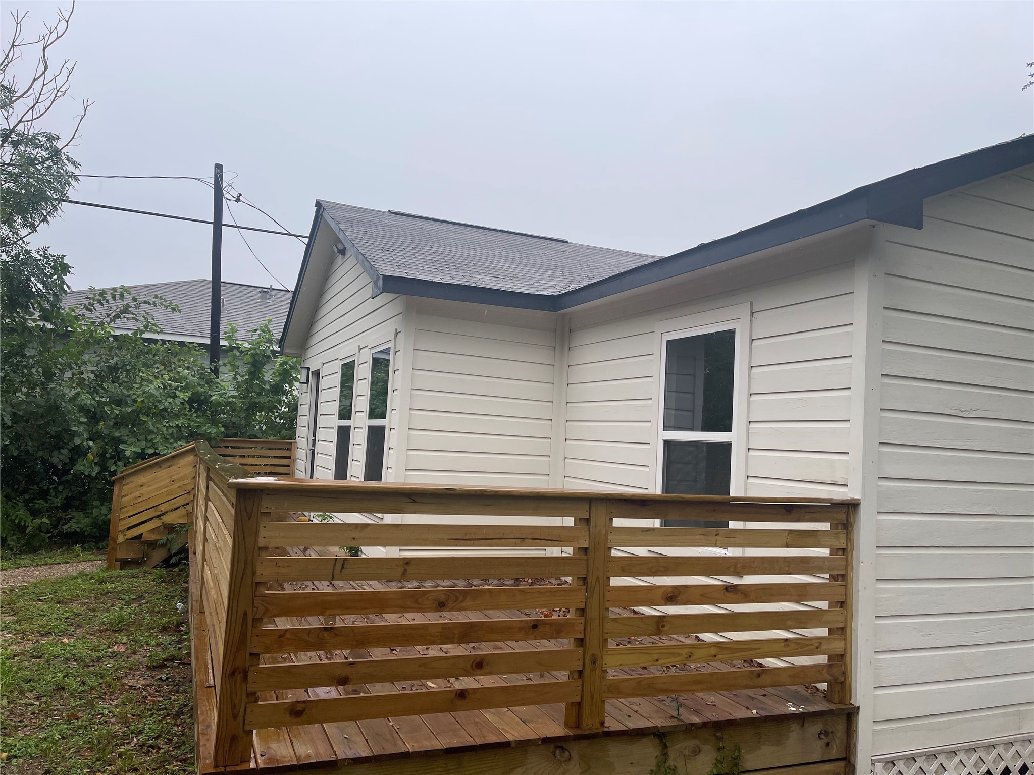 9434 Rhode Island Street Houston, TX 77029 - Photo 3 of 15 a view of a house with a window