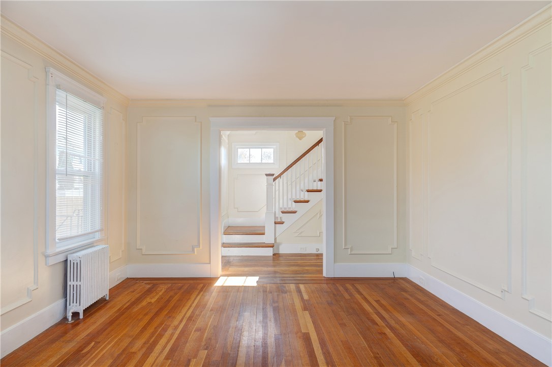 69 Carroll Avenue Newport, RI 02840 - Photo 13 of 27 living room towards staircase