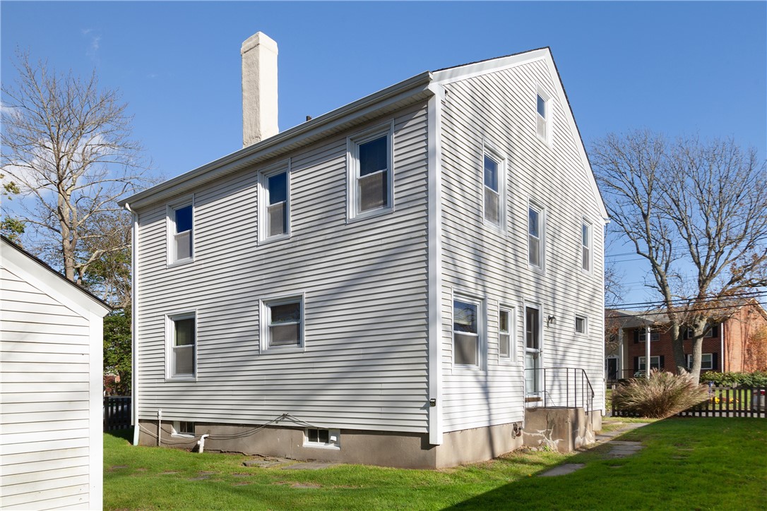 69 Carroll Avenue Newport, RI 02840 - Photo 24 of 27 Back of house, view of side door