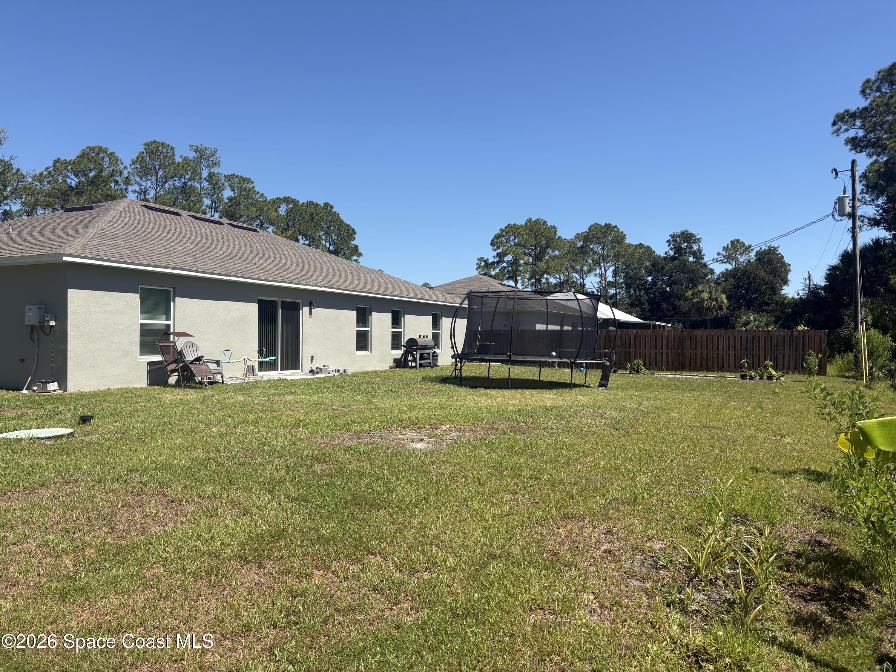 3197 Westover Avenue Southeast Palm Bay, FL 32909 - Photo 17 of 19 back1