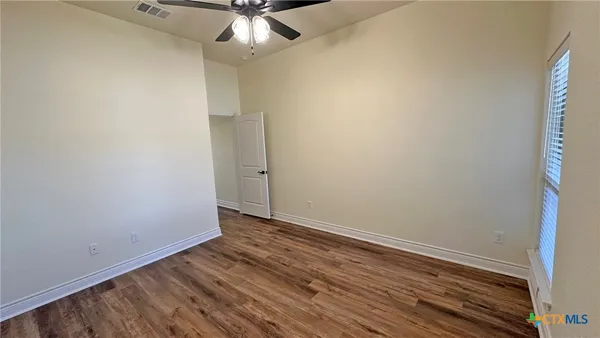 a view of a kitchen from a balcony