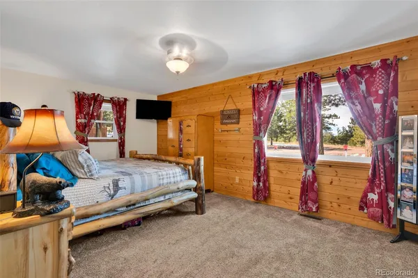 a bedroom with a bed and a walk in closet