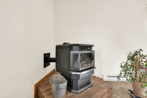 a stove top oven sitting inside of a kitchen