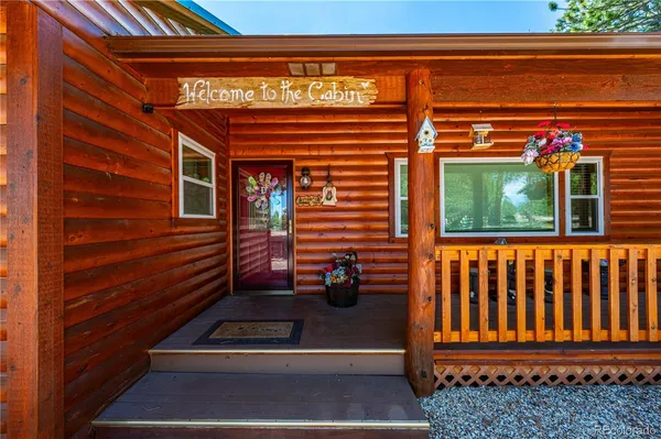 a view of porch with a bench