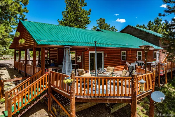 a view of a chairs and tables in the balcony