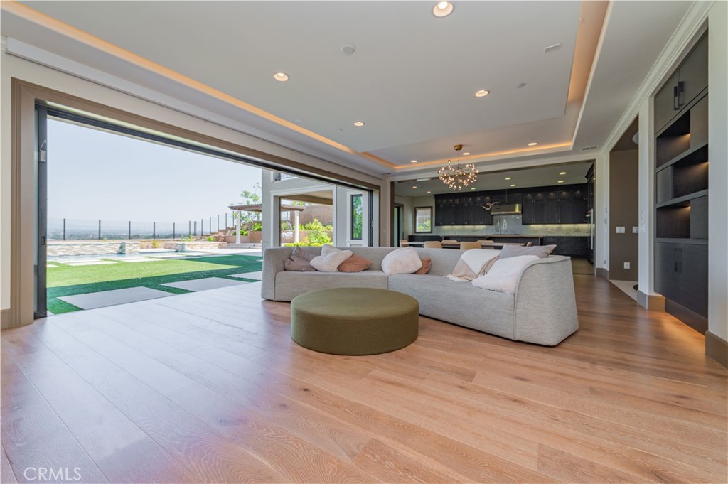122 Scenic Crest Irvine, CA 92618 - Photo 11 of 68 a living room with furniture and a flat screen tv