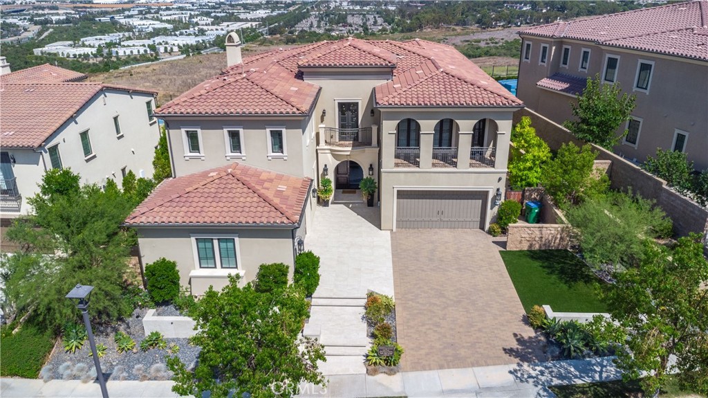 122 Scenic Crest Irvine, CA 92618 - Photo 2 of 68 a front view of a residential houses with yard