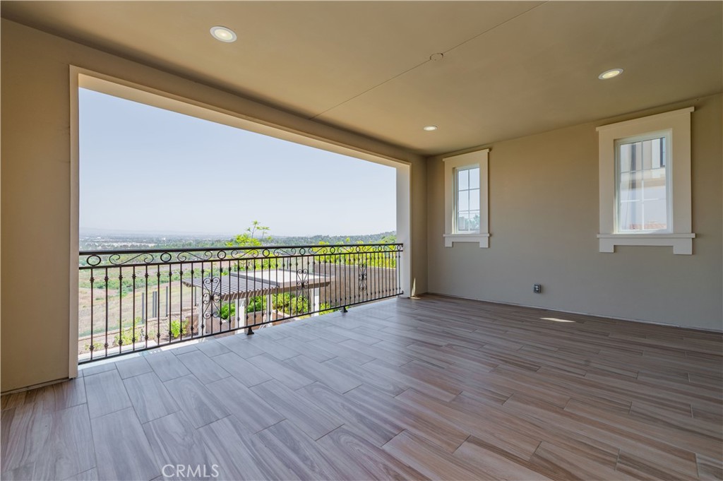 122 Scenic Crest Irvine, CA 92618 - Photo 35 of 68 a view of a room with wooden floor