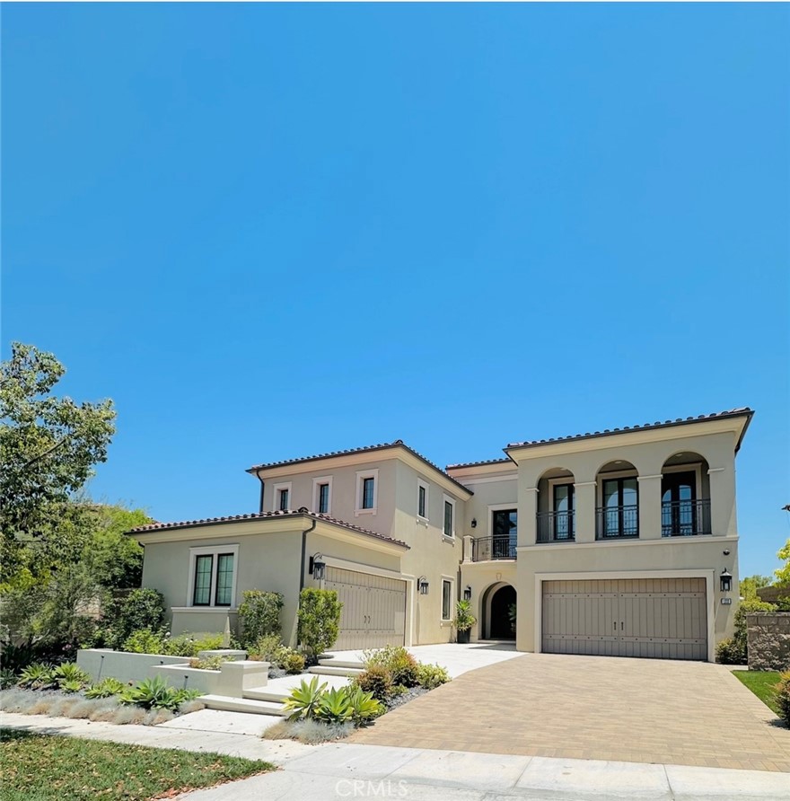 122 Scenic Crest Irvine, CA 92618 - Photo 4 of 68 a front view of a house with a garden