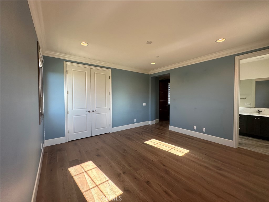122 Scenic Crest Irvine, CA 92618 - Photo 41 of 68 a view of empty room with wooden floor