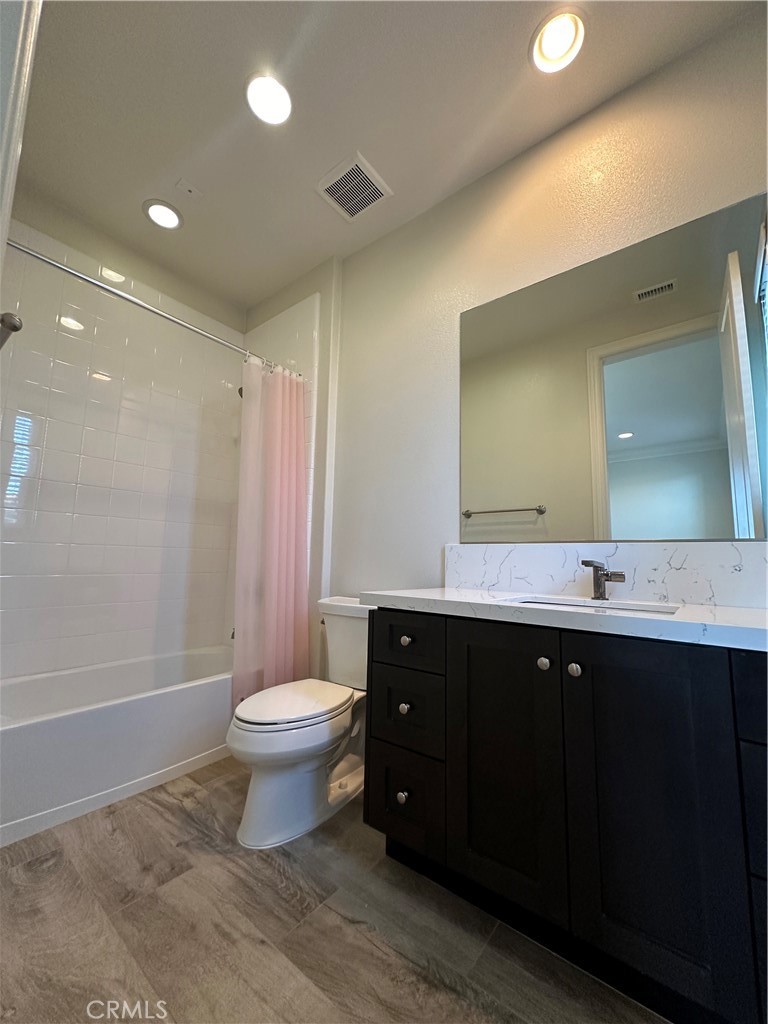 122 Scenic Crest Irvine, CA 92618 - Photo 42 of 68 a bathroom with a sink vanity mirror and toilet