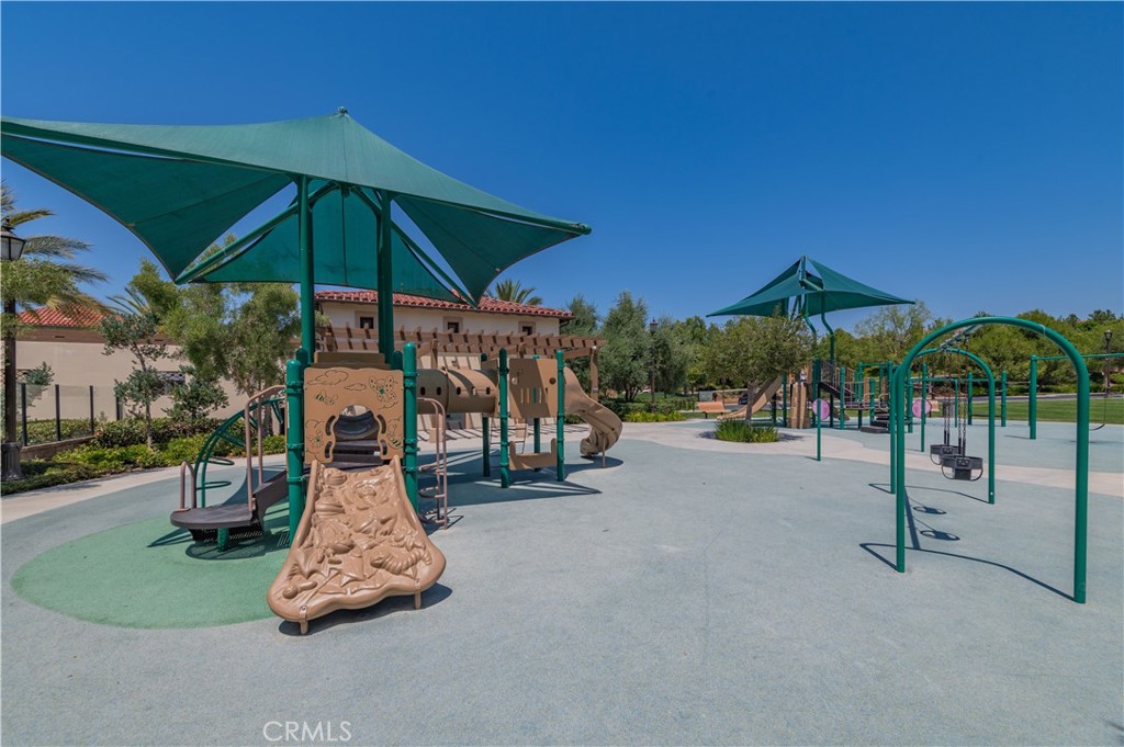 122 Scenic Crest Irvine, CA 92618 - Photo 68 of 68 a street view with a sitting space