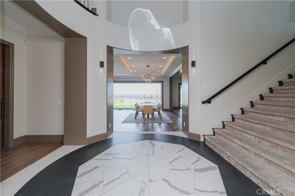 122 Scenic Crest Irvine, CA 92618 - Photo 7 of 68 a view of entryway and hall with wooden floor
