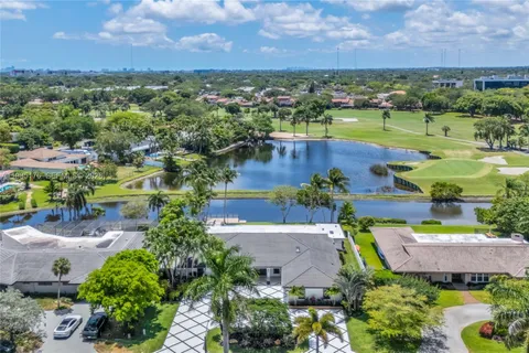 an aerial view of a house with a garden