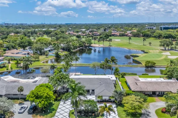 an aerial view of a house with a garden