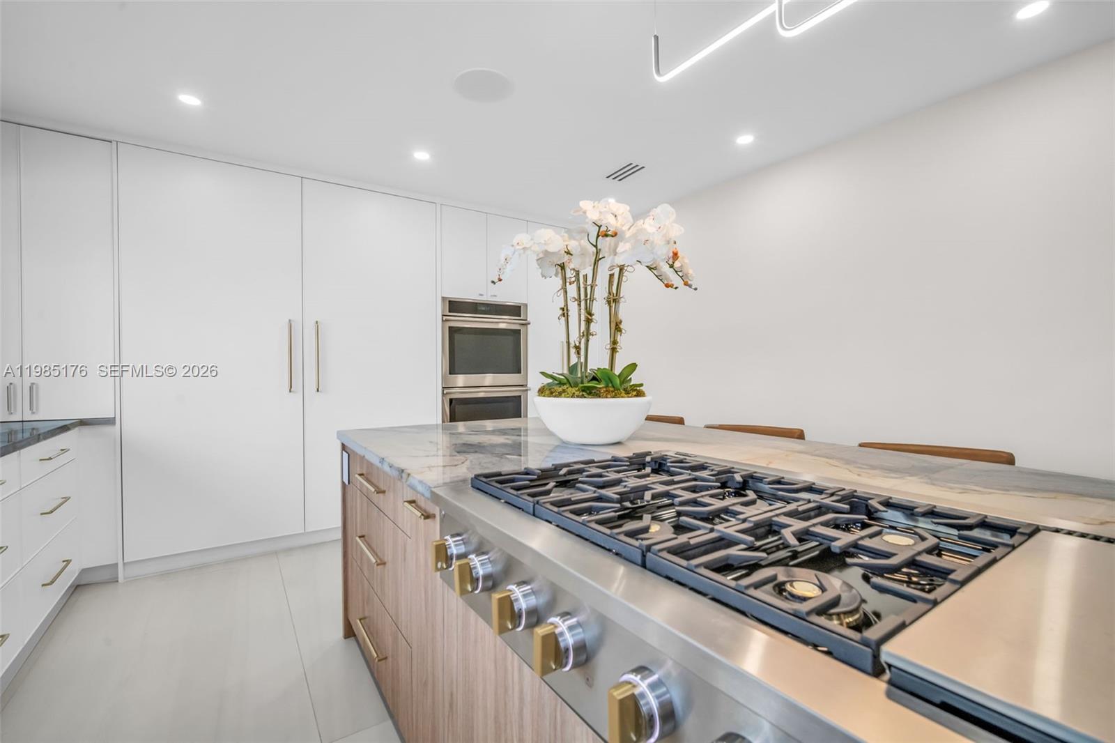 4430 Casper Court Hollywood, FL 33021 - Photo 15 of 64 a stove top oven sitting inside of a kitchen