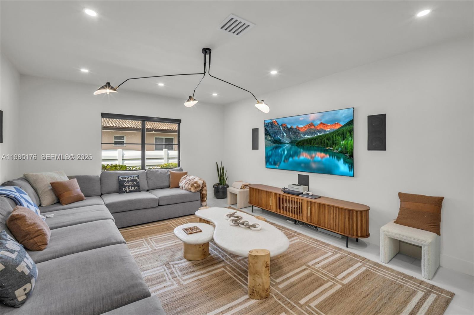 4430 Casper Court Hollywood, FL 33021 - Photo 17 of 64 a living room with furniture and a flat screen tv