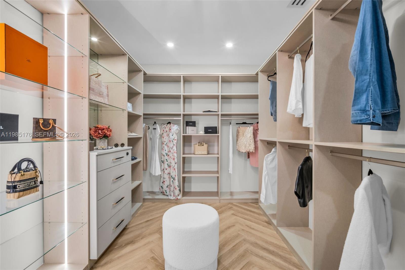 4430 Casper Court Hollywood, FL 33021 - Photo 24 of 64 a view of walk in closet with clothes and shoes