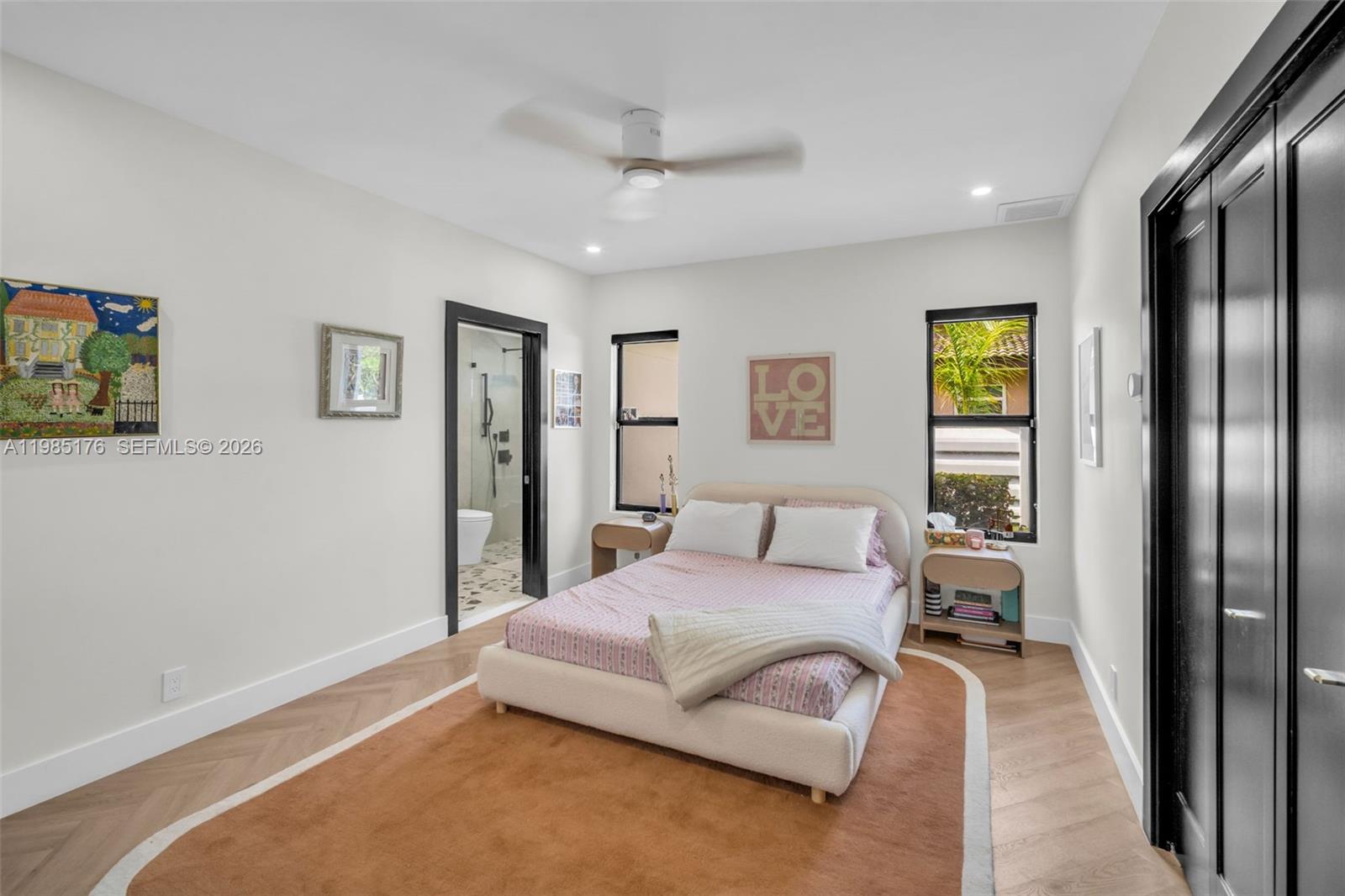 4430 Casper Court Hollywood, FL 33021 - Photo 32 of 64 a bedroom with a bed couch and a window