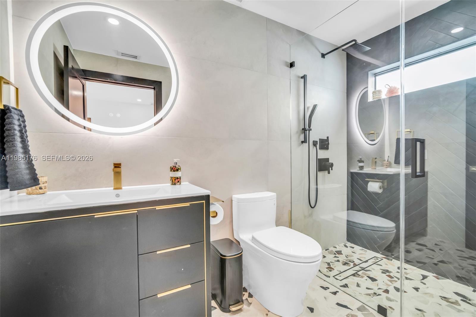 4430 Casper Court Hollywood, FL 33021 - Photo 33 of 64 a bathroom with a sink a toilet and shower