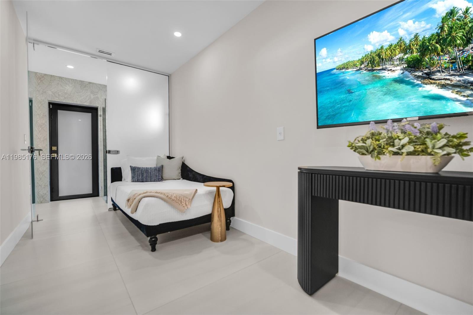 4430 Casper Court Hollywood, FL 33021 - Photo 34 of 64 a bedroom with a bed and a painting on the wall