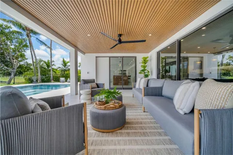 a view of a lake with a house in the background