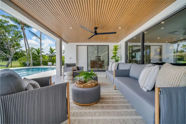 a view of a lake with a house in the background