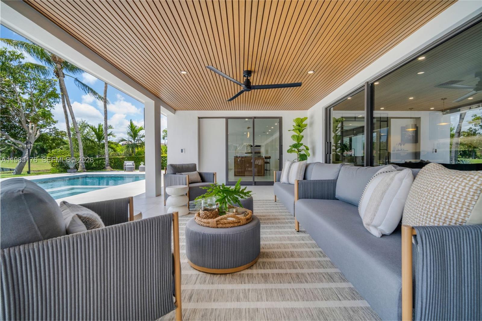 4430 Casper Court Hollywood, FL 33021 - Photo 39 of 64 a living room with furniture and a potted plant